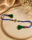 Peacock kundan & Royal Blue Thread Tassels Rakhi