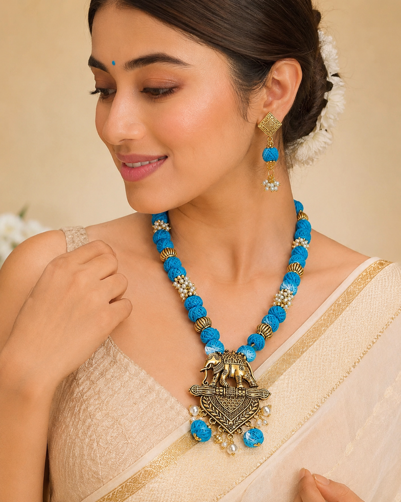 Handcrafted Elephant Pendant  & Blue Cotton BallsTemple Necklace